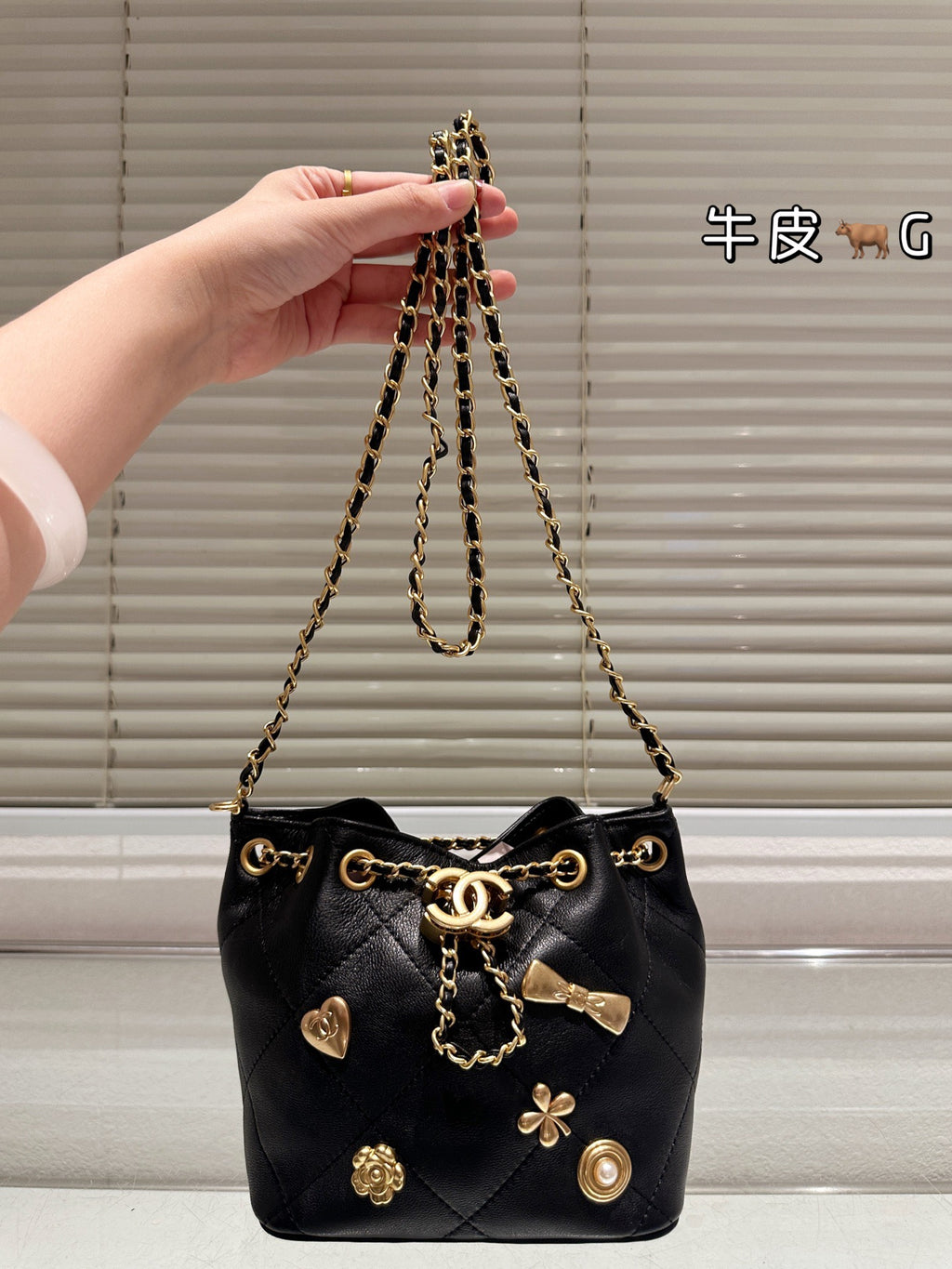 Cc 25K Black and Gold Drawstring Bucket Bag