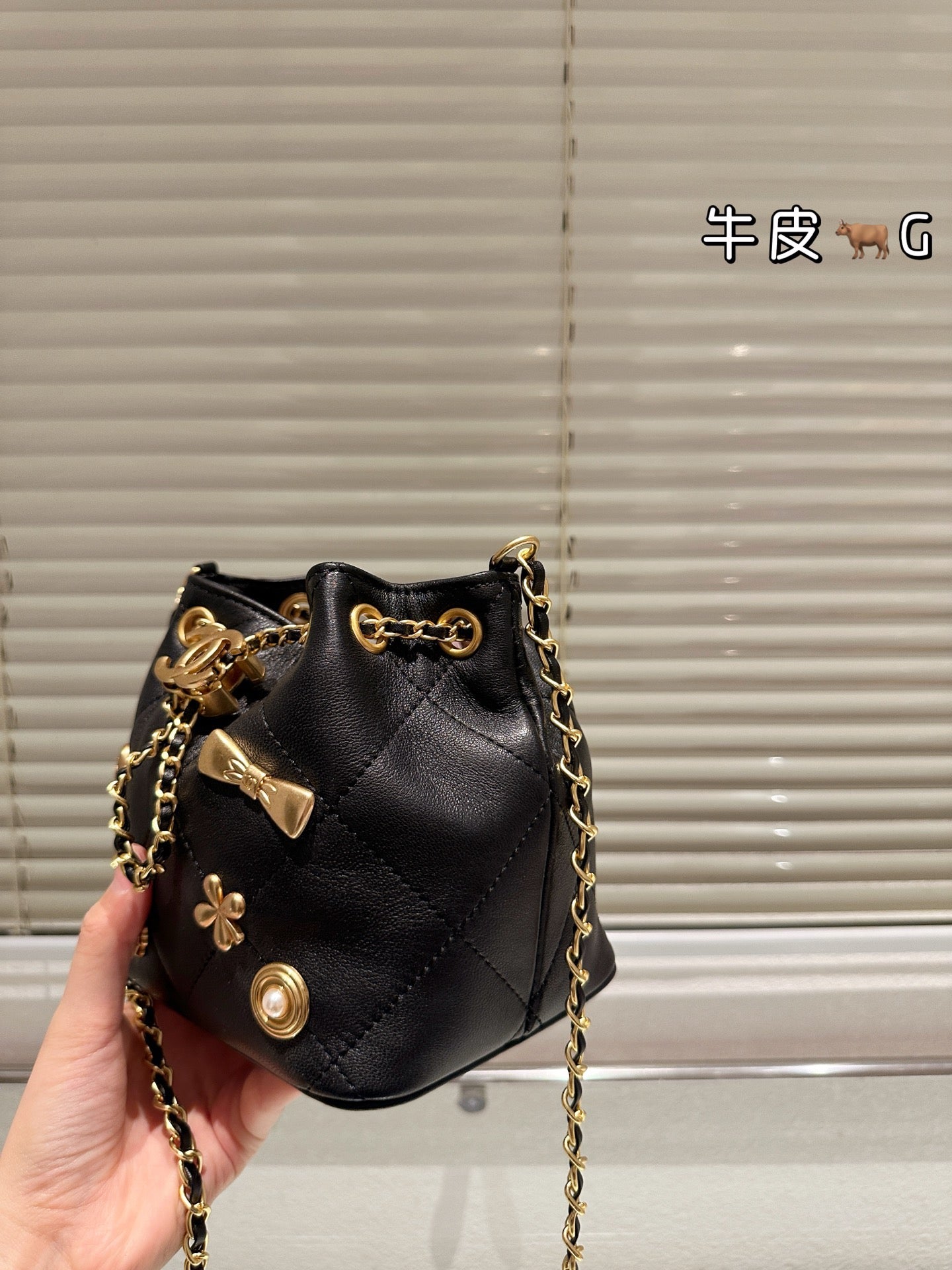 Cc 25K Black and Gold Drawstring Bucket Bag