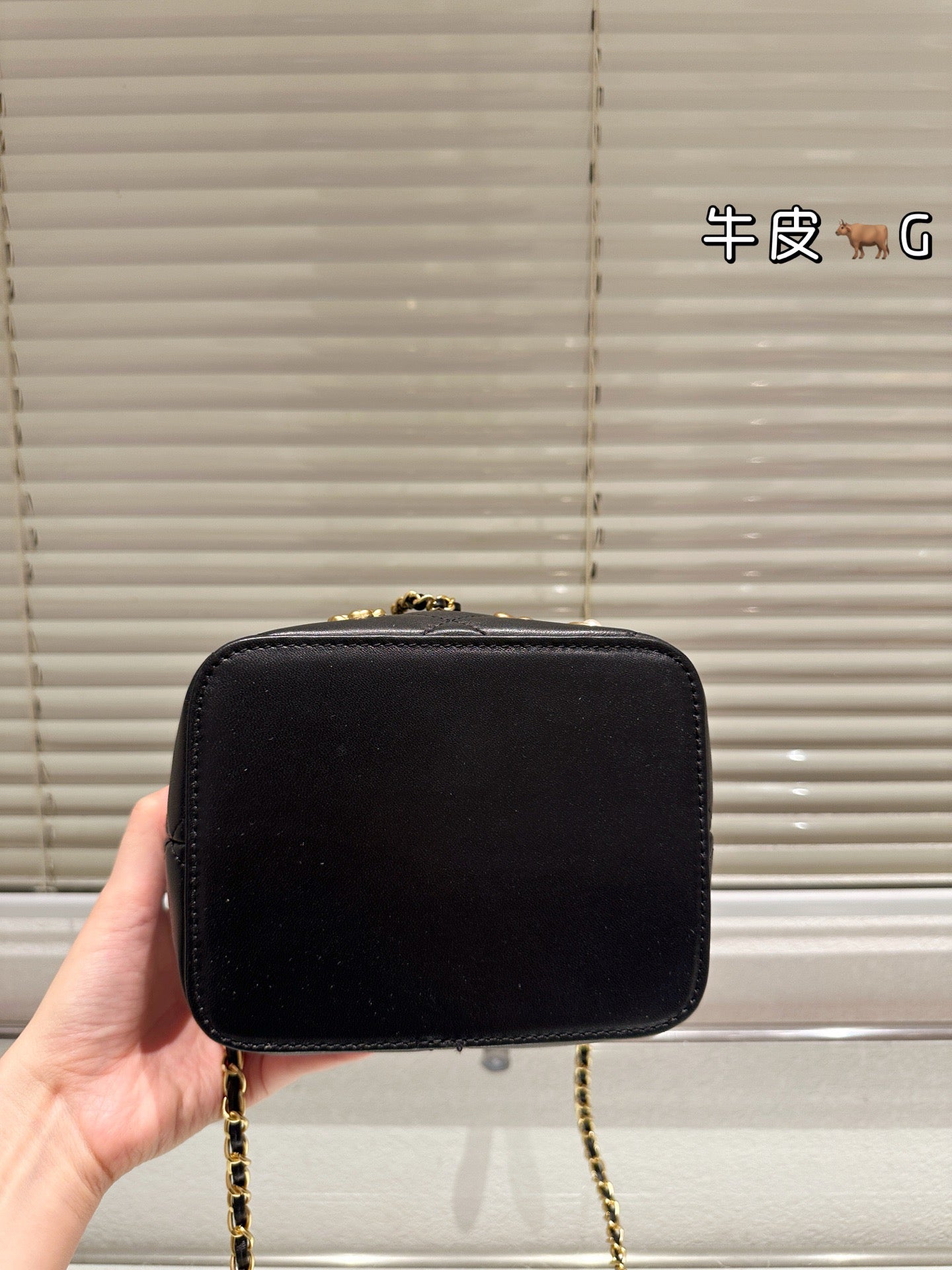 Cc 25K Black and Gold Drawstring Bucket Bag