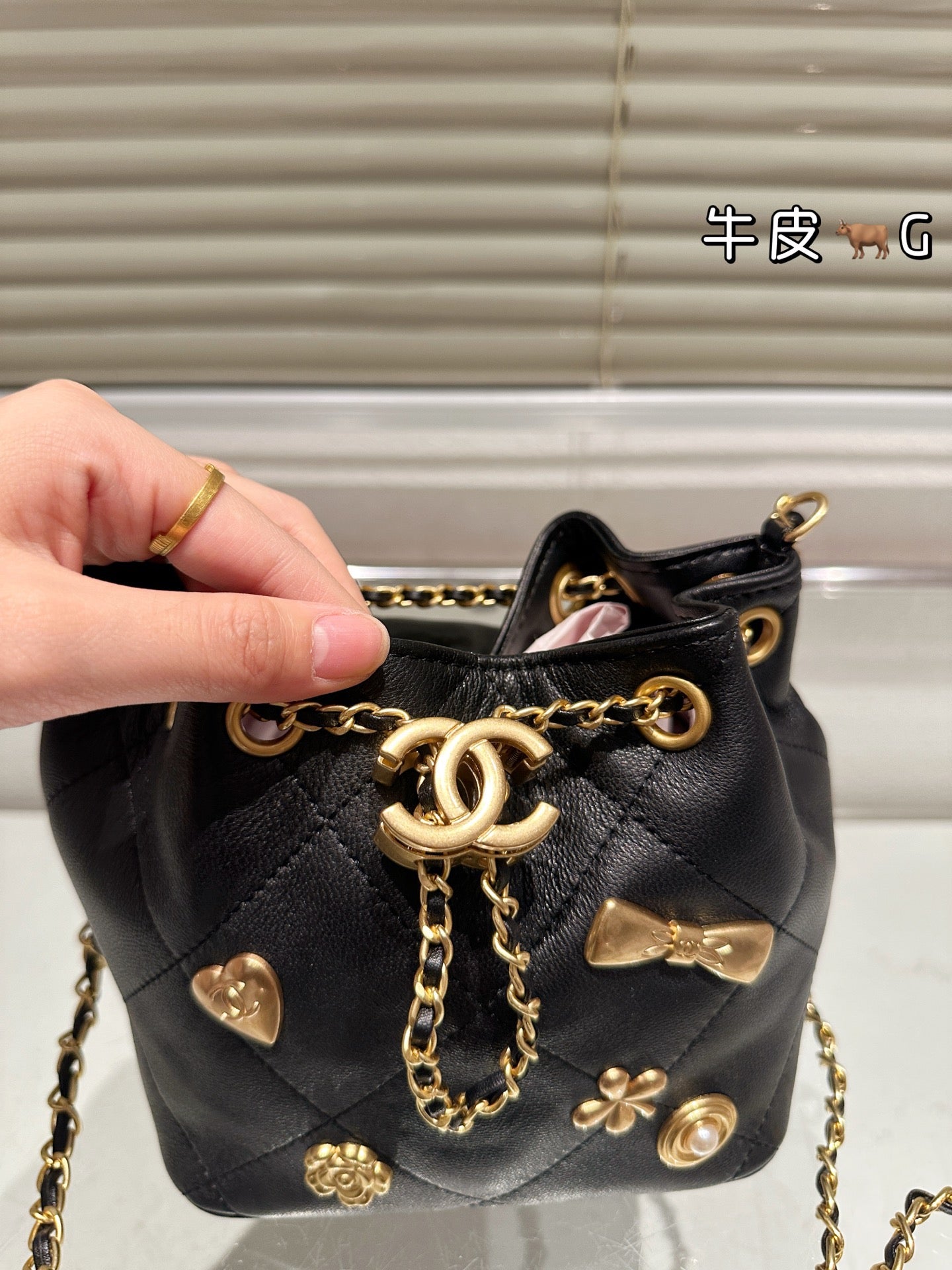 Cc 25K Black and Gold Drawstring Bucket Bag